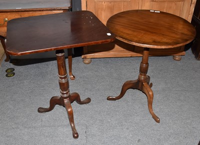 Lot 1325 - A George III mahogany tilt top tripod table,...