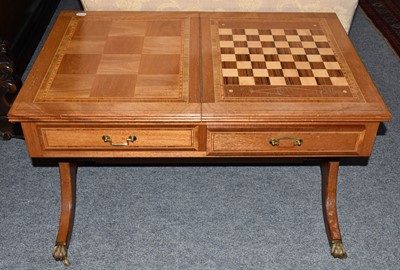 Lot 1267 - A crossbanded and inlaid games topped coffee...