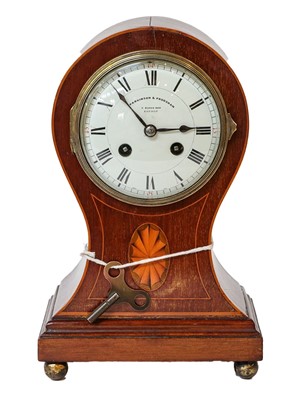 Lot 348 - An Edwardian mahogany inlaid balloon-shaped...