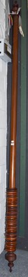 Lot 1244 - A 19th-century mahogany large curtain pole,...