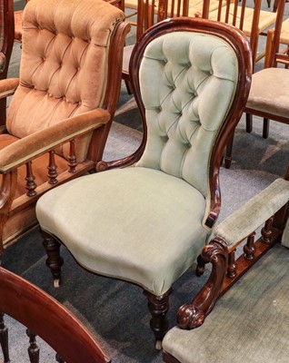 Lot 1361 - A Victorian spoon back and buttoned nursing chair