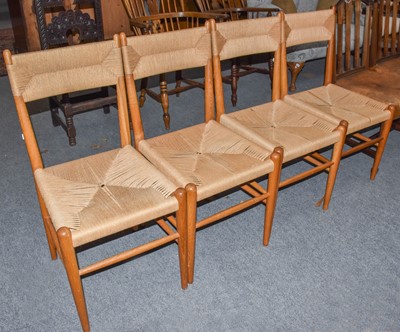 Lot 1365 - A set four Danish oak dining chairs, with...