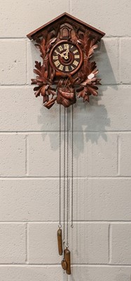 Lot 1422 - A Black Forest striking cuckoo clock, circa 1900