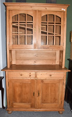 Lot 1301 - A 20th-century pine farmhouse dresser 122cm by...