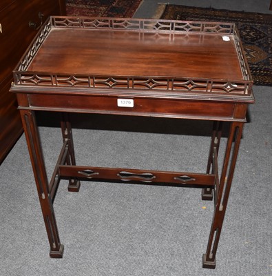 Lot 1379 - A Chippendale style mahogany silver table,...