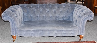 Lot 1277 - Victorian blue upholstered Chesterfield sofa...