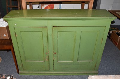 Lot 1225 - A Victorian green painted pine two door...