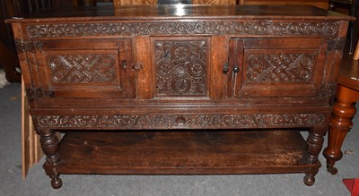 Lot 1371 - A 17th century carved oak sideboard dated 1696,...