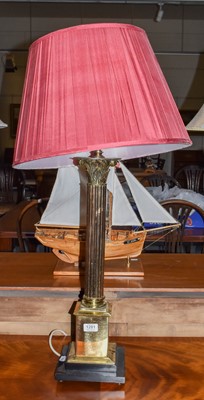 Lot 1281 - A modern brass corinthian columnar table lamp,...