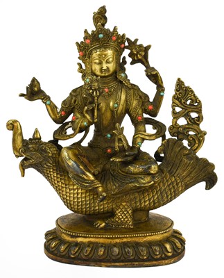 Lot 688 - A Sino-Tibetan Gilt Bronze Figure of...