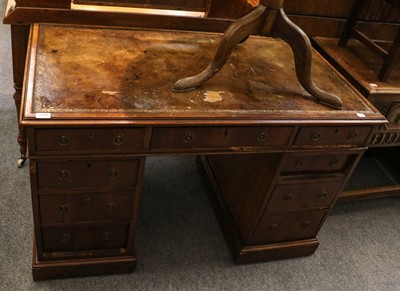 Lot 1402 - A leather inset twin pillar writing desk,...