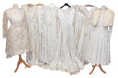 Lot 2052 - Early 20th Century Wedding Gowns, comprising a...