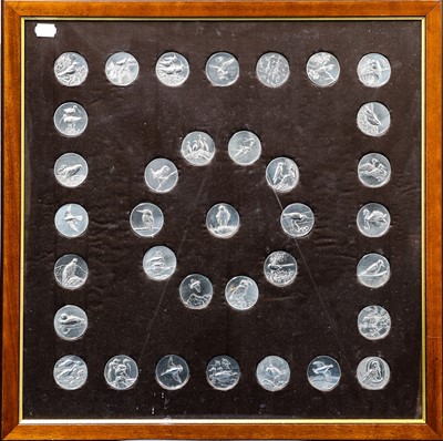 Lot 450 - A Framed Set of Thirty-Five Silver Medallions,...