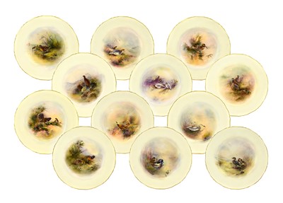 Lot 32 - A Set of Twelve Royal Worcester Porcelain...