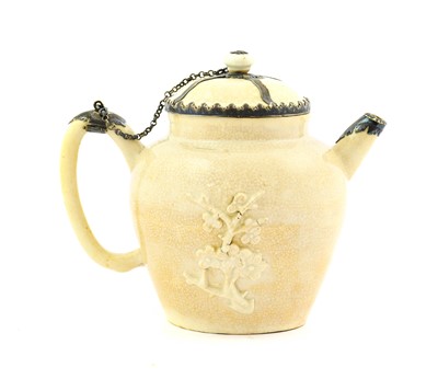 Lot 66 - ^ A Chinese White Metal Mounted Blanc de Chine...
