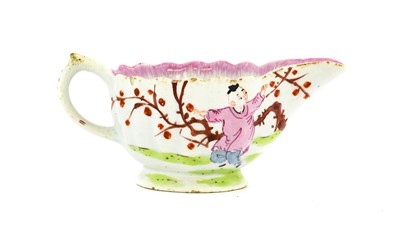 Lot 12 - A Bow Porcelain Creamboat, circa 1760, painted...