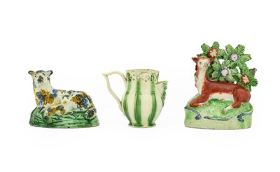 Lot 47 - A Prattware Sheep, circa 1800, recumbent with...
