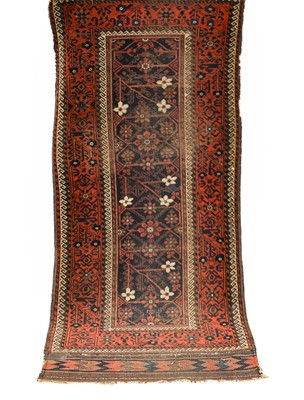 Lot 551 - Rare Baluch Rug Khorasan, circa 1870 The deep...