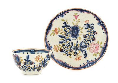 Lot 14 - A Lowestoft Porcelain Tea Bowl and Saucer,...