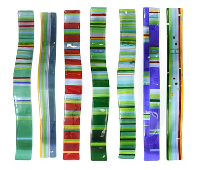 Lot 52 - A Set of Seven Glass Wave Shaped Wall...