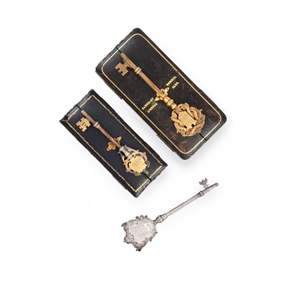 Lot 2073 - Five Edward VII or George V Silver or Silver-Gilt Presentation Keys