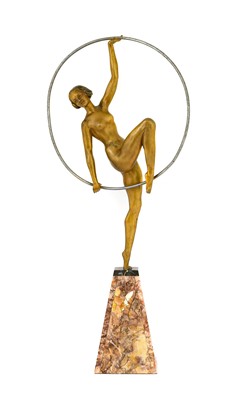 Lot 109 - An Art Deco Patinated Spelter Figure, modelled...