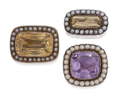 Lot 2004 - An Edwardian Amethyst and Split Pearl Brooch, An Edwardian Citrine and Split Pearl Brooch and An Early 20th Century Topaz and Split Pearl Brooch