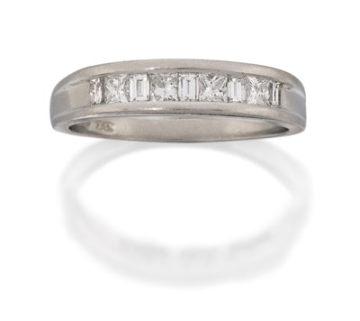 Lot 2184 - A Platinum Diamond Half Hoop Ring