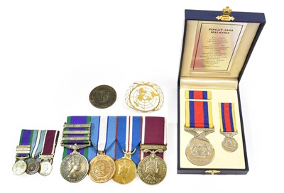 Lot 2005 - An Elizabeth II Long Service Group of Four...