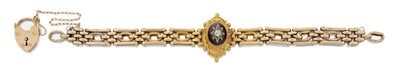 Lot 2025 - A Victorian Garnet and Diamond Brooch, Bangle and Bracelet