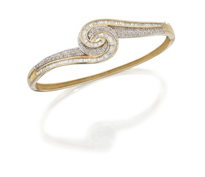 Lot 2120 - A 9 Carat Gold Diamond Bangle