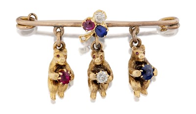 Lot 2043 - A Ruby Sapphire and Diamond Bar Brooch
