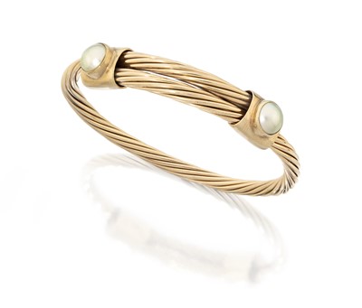 Lot 2121 - A 9 Carat Gold Split Pearl Bangle