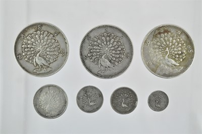 Lot 154 - ♦7 x Kingdom of Burma, Silver ‘Peacock’ Coins,...