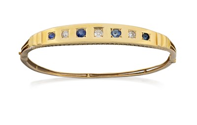 Lot 2053 - A Sapphire and Diamond Hinged Bangle