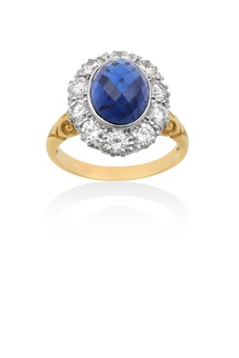 Lot 2025 - An 18 Carat Gold Sapphire and Diamond Cluster...