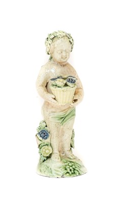 Lot 322 - A Whieldon Type Creamware Figure of a Flower...