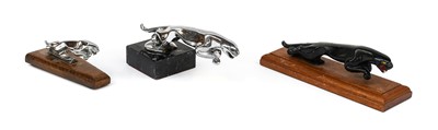 Lot 2 - A Jaguar Car Mascot, mounted on a modern black...