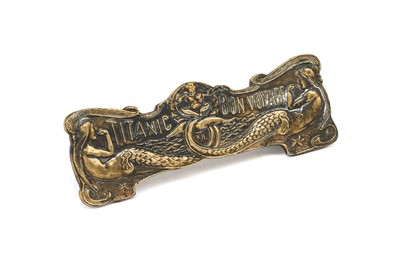 Lot 81 - A Dashboard Bronze Plaque, stamped TITANIC BON...