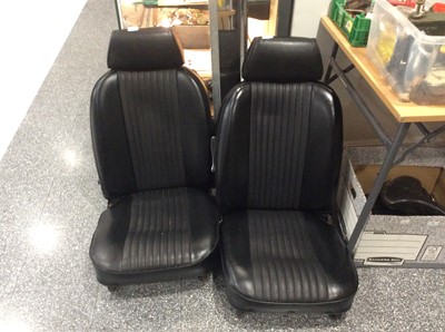 Lot 516 - A Pair of Black Vinyl Covered Car Seats,...
