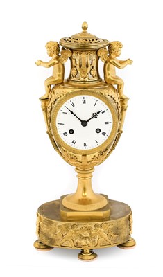 Lot 388 - A French Empire Urn Shaped Ormolu Striking...