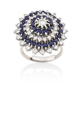 Lot 2022 - An 18 Carat White Gold Sapphire and Diamond...