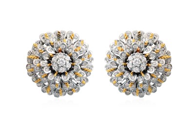 Lot 2012 - A Pair of Diamond Cluster Earrings the central...