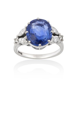 Lot 2076 - A Sapphire and Diamond Ring the cushion shaped...