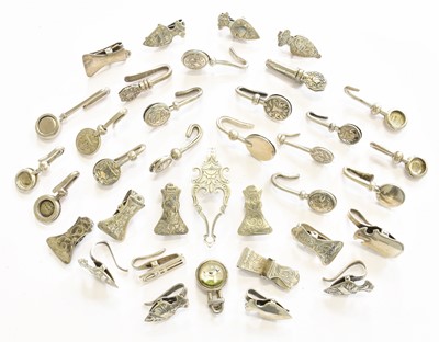 Lot 39 - A Collection of Silver and White Metal Napkin...