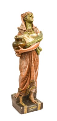 Lot 1002 - A French Painted Terracotta Figure of PORTEUSE...