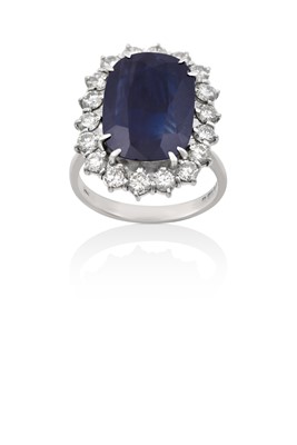 Lot 2024 - An 18 Carat White Gold Sapphire and Diamond...