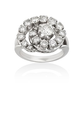 Lot 2013 - A Diamond Cluster Ring the central round...