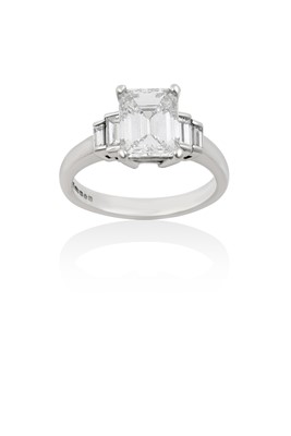 Lot 2097 - A Platinum Diamond Ring the central...