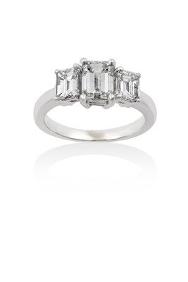 Lot 2016 - A Diamond Three Stone Ring the graduated...